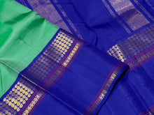 Sarasangi- Beautiful Pastel Green with Royal Blue Handwoven Pure Jari Korvai Kanjivaram Silk with beautiful borders rich seer pallu and contrast woven blouse