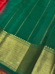 Red with Green Handwoven Pure Jari Kanjivaram Silk Saree with Buttas woven in muthukattam body with rich pallu and contrast Emerald Green Blouse beauty