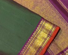 Nayaki- Deep Forest Green with Dark magenta Small borders Handwoven Pure Jari Kanjivaram Silk with small borders rich pallu and contrast woven blouse