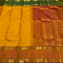 Mustard with Ganga Jamuna Borders with Dual tone Orange mustard Pallu and blouse in a beautiful Neli Veldhari Handwoven Pure Jari Kanjivaram Silk Saree beauty