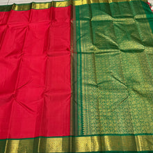Sarasangi- Gorgeous Red with Emerald Green Handwoven Pure Jari Korvai Kanjivaram Silk with beautiful gandaberundas woven borders with rich 1000 buttas pallu and contrast emerald green blouse beauty