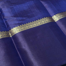 Lavenderish Blue with Navy Blue with Muthukattam Checks and Iruthalaipakshi border buttas Handwoven Pure Kanjivaram Silk Saree Beauty