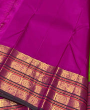 Vaibhogam- Stunning Parrot Green with Fuchsia Pink Handwoven Pure Jari Korvai Kanjivaram Silk with beautiful buttas woven body with rich varisaipet borders beautiful pallu and contrast woven blouse with bottle green selvedges
