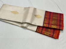 Vaibhogam-Mesmerizing Offwhite with Deep Maroonish Brown Handwoven Pure Jari Korvai Kanjivaram Silk with beautiful buttas gorgeous varisaipet borders rich pallu and contrast woven blouse