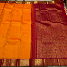 Sarasangi- Vintage Style Mambazham Yellow with Arakku Handwoven Pure 2g Jari Korvi Kanjivaram Silk with Green Selvedges with beautiful gandaberundas woven borders rich pallu and contrast woven blouse