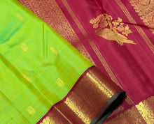 Vaibhogam- Gorgeous Parrot Green with Deep Red Handwoven Pure Jari Korvai Kanjivaram Silk with beautiful thilagam and mayil buttas woven body with beautiful borders rich parrot motifs woven beautiful pallu and contrast woven blouse
