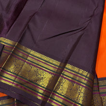 Vaibhogam- Mesmerizing Orange with Deep Coffee Brown Pure2g Jari handwoven Kanjivaram Silk with beautiful pattu buttas woven body with beautiful meenakari work woven rich borders and pallu and contrast woven beautiful blouse