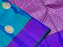Gorgeous Dual tone Peacock Blue Green with Purple Handwoven pure Jari Kanjivaram Silk Saree with Horse motifs woven body plain beautiful borders rich mayil chakram buttas woven pallu and contrast woven blouse