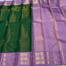 Vaibhogam- Gorgeous Deep Emerald Green with Lavendar  Korvai Handwoven Pure Jari Kanjivaram Silk with Vairaoosi Body with beautiful borders rich pallu and contrast Vairaoosi woven lavendar blouse