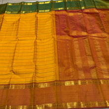 Mustard with Ganga Jamuna Borders with Dual tone Orange mustard Pallu and blouse in a beautiful Neli Veldhari Handwoven Pure Jari Kanjivaram Silk Saree beauty