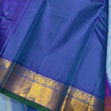 Nayaki- Gorgeous Powder Blue with Peacock Blue Handwoven Pure Jari Kanjivaram Silk with bawanchi borders rich seer pallu and contrast woven blouse