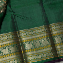 Saraswati- Gorgeous Coffee Brown with  Deep Emerald Green Handwoven Premium Zariless Kanjivaram Silk with beautiful muthukattam silk checked body with gorgeous varisaipet borders rich sorgavaasal pallu and contrast woven blouse