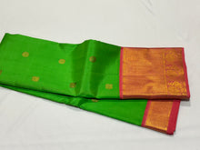 Bright Parrot Green with Coral Pink Handwoven Pure Jari Korvai Kanjivaram Silk Saree with Buttas woven body rich borders pallu and contrast woven blouse beauty