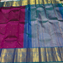 Vaibhogam- Vintage Inspired Beautiful Deep Wine with Peacock Blue Handwoven Pure Jari Korvai Kanjivaram Silk with missing checks style woven body with small buttas all over with beautiful rich borders pallu and contrast self striped blouse