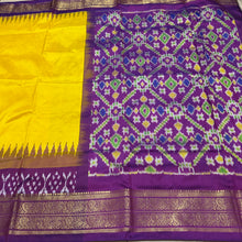 Arabhi- Gorgeous Yellow with Purple Handwoven Pure Double Ikat Silk with beautifully woven body with temples and ikat style woven kanchi borders rich pallu and contrast woven blouse