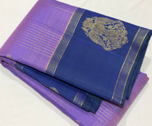Sahana- Gorgeous December Poo Lavendar with Deep Peacock Blue Handwoven Pure Jari checked kanjivaram silk with buttas in the body with beautiful Gandaberundas woven either side borders rich pallu and contrast Jari striped blouse