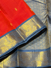 Vaibhogam- Strikingly Beautiful Fanta Orange with Grey Buttas Handwoven Pure Jari Korvai Kanjivaram Silk with beautiful borders rich pallu and contrast woven blue woven blouse