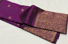 Vaibhogam- Stunning Deep Purple with Gold Handwoven Pure 2g Jari Kanjivaram Silk with beautiful yazhi and mayil buttas woven body with rich Vanasingaram borders on either sides with rich pallu and self colored blouse