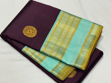 Gorgeous Dark Kanchana Brown with dual tone aqua blue green Handwoven Pure Jari Korvai Kanjivaram Silk Saree with Rich Peacock Buttas Woven body beautiful borders rich pallu with intricate motifs and contrast woven blouse