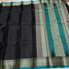 Mindblowing Black with Teal Handwoven Pure Zariless Kanjivaram Silk with intricately woven self Muthukattam body checks rich borders gorgeous pallu and Jacquard blouse beauty