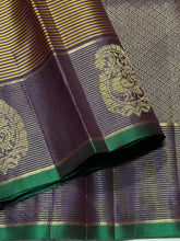 Sahana- Gorgeous Bronze Gold with Deep Purplish Brown Handwoven Pure Kanjivaram Silk with Striped body rich peacocks in paisley motifs woven borders with green selvedges rich pallu and contrast woven blouse