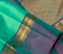 Sahana- Beautiful Turquoise Green with Teal Shot Purple  Muthukattam Handwoven Pure Jari Kanjivaram Silk with beautiful body spaced borders rich pallu and contrast woven blouse