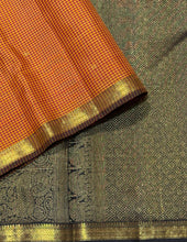 Saranga- Beautiful Burnt Orange with Black Buttas with Small borders Handwoven Pure Jari Podikattam Checked body with rich yazhis elephants mayil chakram woven gorgeous pallu and contrast black blouse