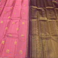 Saranga- Fantastic Borderless Handwoven Pure Jari Kanjivaram Silk in a beautiful pink and blue muted checked body with elephants motifs woven all over the body with rich deep brown pallu and contrast woven blouse