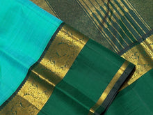 Vaibhogam- Beautiful Light Green with Dark Bottle Green Handwoven Pure Zari Korvai Kanjivaram Silk with beautiful spaced light and dark green double borders rich seer pallu and contrast woven bottle green blouse