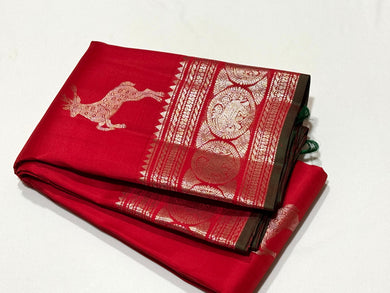Red with Silver Jari Handwoven Pure Kanjivaram Silk Saree with Green Selvedges with Deer motifs woven all over the body with rich borders pallu and self colored blouse