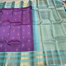 Vaibhogam- Gorgeous Medium Lavendar with Turquoise Blue Handwoven Pure Jari Korvai Buttas Woven Kanjivaram with Rich Varisaipet Borders Beautiful Pallu and Contrast Woven Blouse