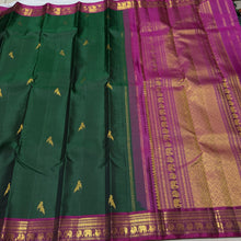 Sahana- Stunning Bottle Green with Deep Magenta Handwoven Pure Jari Rettaikili Buttas Handwoven Kanjivaram Silk with gorgeous Borders and Pallu woven with lot of details and contrast woven blouse