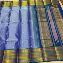 Saraswati- Powder Blue with Peacock Blue Handwoven Pure Zariless Premium Kanchipuram Silk with beautiful varisaipet borders rich pallu and contrast peacock blue blouse
