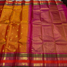Sahana- Super Gorgeous Beautiful Simha Color (dual tone orange shot mustard shade) with Rich Pink Handwoven Pure Kanjivaram Silk with Mayil Chakram Buttas woven body with beautiful borders rich pallu and contrast woven blouse