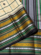 Saraswati- Offwhite with Deep Blackish Brown Handwoven Pure Premium Zariless Korvai Kanjivaram Silk with beautiful neli veldhari checked body with mango and chakram buttas with rich varisaipet borders rich pallu and contrast woven blouse