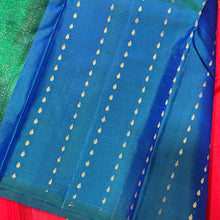 Strikingly beautiful Red with Peacock Blue Handwoven Pure Jari Borderless Muthukattam with Buttas Kanjivaram Silk Saree with double parrot motifs woven body rich pallu and contrast buttis woven blouse