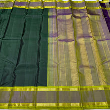 Sarasangi-Gorgeous Handwoven Pure Korvai Kanjivaram Silk in a beautiful Bottle Green with Dual tone Violetish Green and Parrot Green Rettapet borders with beautiful pallu and contrast woven blouse