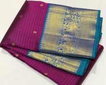 Vaibhogam- Vintage Inspired Beautiful Deep Wine with Peacock Blue Handwoven Pure Jari Korvai Kanjivaram Silk with missing checks style woven body with small buttas all over with beautiful rich borders pallu and contrast self striped blouse