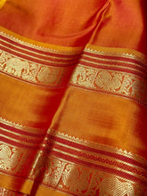 Red with Golden Mustard Buttas with Continuous Thodar Elephant  Motifs Pallu and Doublepet Borders Beauty