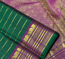 Sahana- Beautiful Deep Forest Green with Dark Magenta Handwoven Pure Jari Kanjivaram Silk with Jari Neliveldhari Striped body with rich borders pallu and contrast woven blouse