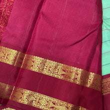 Vaibhogam-Gorgeous Korvai Veldhari in a beautiful pastel green with peacock blue and arakku Ganga Jamuna Borders Handwoven Pure Jari Kanjivaram Silk with rich pallu and contrast woven blouse beauty