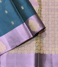 Nayaki- Rama Blue with Mauve Handwoven Pure Lightweight Classic Kanjivaram Silk with buttas woven body with contrast mauve colored borders rich pallu and contrast woven blouse