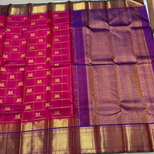 Dual tone Rani Pink with Purple in a rich Handwoven Pure Kanjivaram Silk Saree with Doubleparrots woven in jari checked body beautiful borders pallu and contrast woven blouse