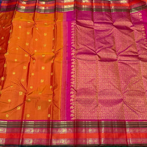 Mango Orange with Rani Pink Buttas with rettapet borders Handwoven Pure Jari Kanjivaram Silk Saree Beauty