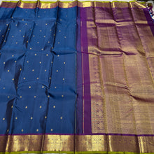 Sahana- Deep Sapphire Blue with Plum Purple Buttas Handwoven Pure Jari Kanjivaram Silk with gorgeous gandaberundas woven borders with green selvedges rich pallu and contrast woven blouse