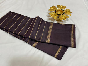 Deep Pakku (Beetlenut) Brown Handwoven Pure Kanjivaram Silk saree in Jari Neli Beldhari woven body with Gandaberundas and Yazhis butta woven borders rich pallu and self colorer blouse beauty