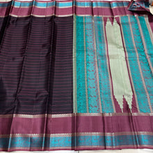 Stunning Black with Teal and Brown Handwoven Pure Zariless Kanjivaram Silk with beautiful borders striped body rich pallu and buttas woven blouse