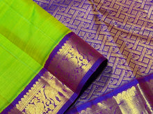 Sarasangi-Beautiful Bright Sneha Green with Violetish Purple Handwoven Pure Korvai Kanjivaram Silk with rich elephant and peacock motifs woven borders rich pallu and contrast woven blouse