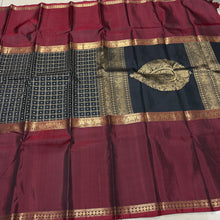 Sahana- Stunning Black with Deep Maroonish Brown Handwoven Pure Jari Kanjivaram Silk with Lakshadeepam Mubbagam Style woven beautiful body with long borders rich pallu and black color blouse with maroonish brown borders
