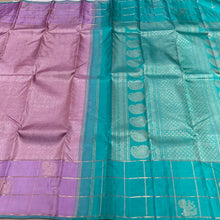 Sahana-Mesmerizing Lavendar with Turquoise Green Brocade Handwoven Pure Jari Kanjivaram with Jari checked borders with peacocks woven with rich turquoise pallu and contrast woven blouse.